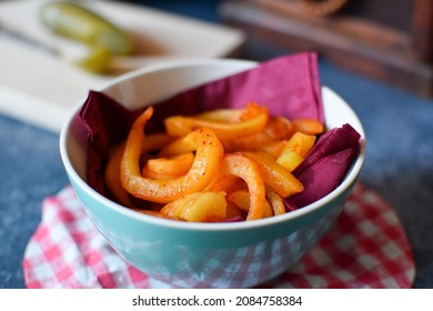 Spicy Curly Fries In A Bowl On A Table