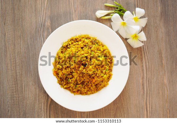 Spicy curry beef fried rice. Chinese food,\
Chinese cuisine, Hong Kong cuisine, Macao cuisine. Indian fusion\
food. Top view                        \
