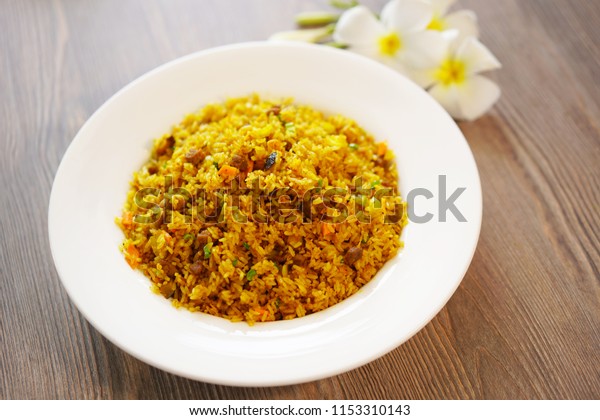Spicy curry beef fried rice. Chinese\
food, Chinese cuisine, Hong Kong cuisine, Macao cuisine. Indian\
fusion food. Top view.                              \
