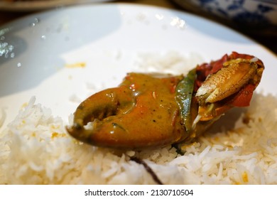 Spicy And Delicious Sri Lanka Curry Crab On A Plate Of Rice. Soft Focus Image.