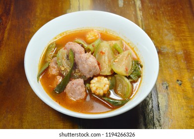 spicy fish ball with mixed vegetable in red curry soup on bowl - Shutterstock ID 1194266326