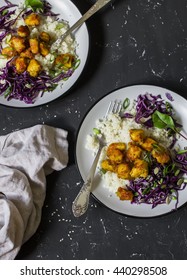 Spicy Fish Taco Bowls - Couscous, Spicy Grilled Fish And Red Cabbage. Delicious Food. On A Dark Stone Background.  Top View