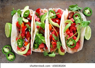 Spicy Fish Tacos With Watermelon Salsa And Avocados, Above View On Rustic Metallic Background