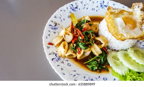 Spicy food Stir fried squid and eggs - Shutterstock ID 635889899