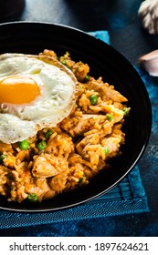 Spicy Fried Rice With Chicken, Kimchi And Egg. Korean Cuisine