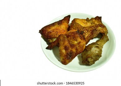 Spicy Grilled Chicken Hip And Leg Chop On Plate