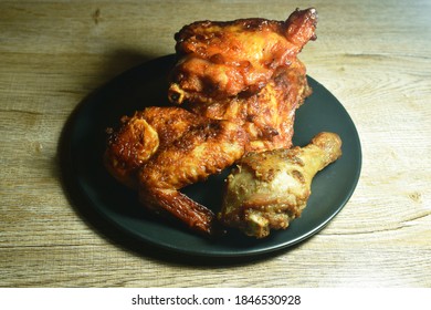 Spicy Grilled Chicken Hip And Leg Chop On Plate