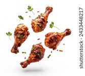 Spicy grilled chicken legs or drumsticks flying with herbs and spices. Floating BBQ chicken drumsticks with vegetables isolated on white background.