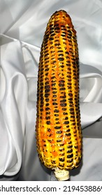 Spicy Grilled Corn, Sweetcorn Grilled And Smeared With Sauce. White Background