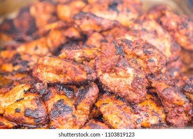 Spicy Grilled Jerk Chicken On The Barbecue - Style Of Cooking Native To Jamaica - Food Street Market