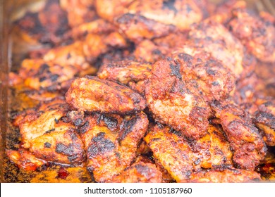 Spicy Grilled Jerk Chicken On The Barbecue - Style Of Cooking Native To Jamaica - Food Street Market