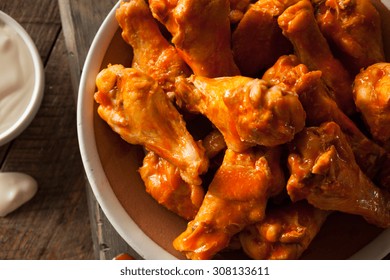 Spicy Homemade Buffalo Wings With Dip And Beer