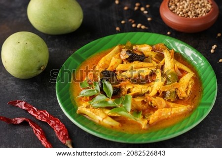 spicy hot anchovy Kerala fish curry. Indian food. Fish curry with red chili, curry leaf, coconut milk. Asian cuisine. Delicious spicy , Bengali , Goan fish curry India Sri Lanka