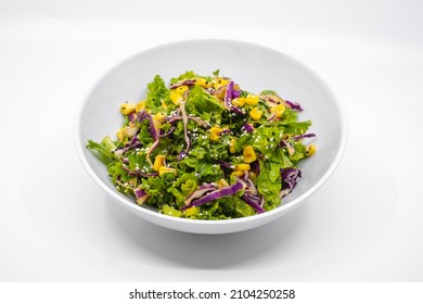 Spicy Kale Salad Bowl On A White Background