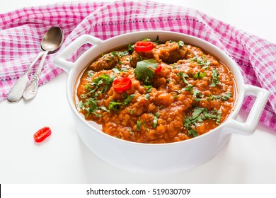 Spicy Lentil And Meatball Soup With Parsley. Casserole On White Table.