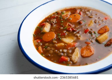 Spicy lentil stew with potatoes and carrots. - Shutterstock ID 2365385681
