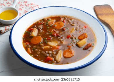 Spicy lentil stew with potatoes and carrots. - Shutterstock ID 2365385715