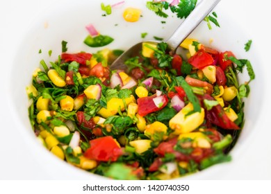 Spicy Mango Salsa In A White Bowl, Ready To Eat And Isolated