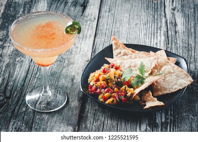 Spicy margarita with fresh mango salsa and home made tortilla chips.