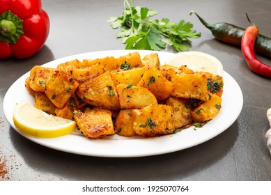 Spicy potato cut in cubes and fried, lebanese cuisine
