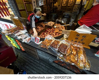 Spicy Rabbit Head Street Food In Chengdu China. High Quality Photo