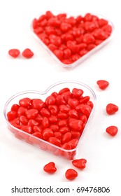 Spicy, Red Hot Cinnamon Candy Hearts In Heart Shaped Dish In Vertical Format With Selective Focus