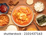 Spicy Rice Cake with Cheese or Teokbokki with spicy sauce Korean traditional food, Tteokbokki is Korean rice cake stick in spicy sauce Korean cuisine dish.