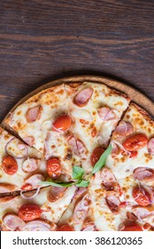 Spicy Sausage Pizza On Wooden Table, Top View