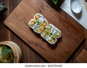 Spicy Scallop Ura Maki On Wooden Plate