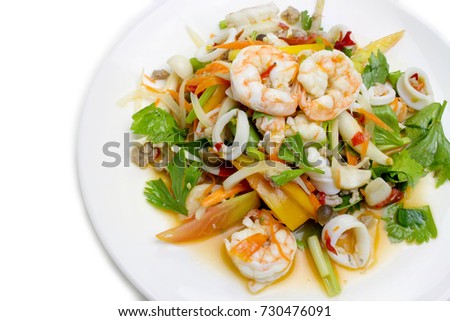 Spicy Seafood Salad isolated on white background.