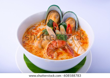 Spicy Seafood Soup on white dish , thai cuisine , white background