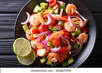 Spicy Shrimp Ceviche With Vegetable Salsa Close-up On A Plate On A Table. Horizontal Top View From Above
