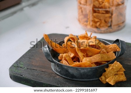 Spicy snack with anchovies flovour