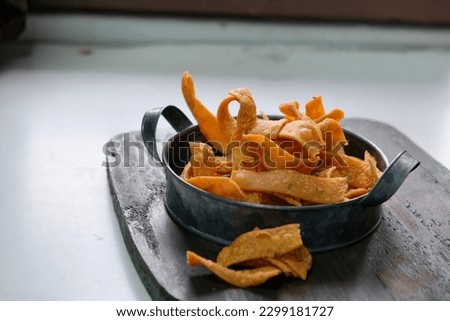 Spicy snack with anchovies flovour