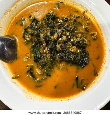 Spicy snail jungle curry is a Thai curry that does not contain coconut milk. It has a hot and spicy taste and a fragrant aroma from various herbs and spices, such as chili, galangal, lemongrass, finge