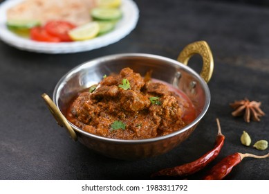 Spicy Sri Lankan beef curry, Goan style beef vindaloo , Traditional Indian Lamb or beef curry . spicy Beef curry gravy popular in Kerala Sri Lanka Goa side dish for Appam, porotta roti bread in India.