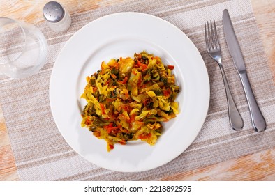 Spicy Stewed White Cabbage As A Side Dish Or Main Dish. The Concept Of Delicious Healthy Food.