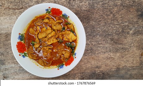 Spicy Stir Fried Pork With Red Curry Paste.