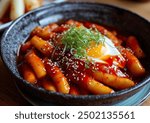 Spicy Tteokbokki served in a bowl with chopsticks, professional food photo, restaurant angle view composition showcasing vibrant colors and textures.