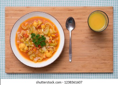 Spicy Winter Broth with Celeriac, Cauliflower, Carrots and Bell Peppers - Shutterstock ID 1238361607