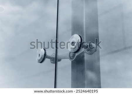 Spider facade fixing system. Elements of fastening of the facade. Facade detail. Elements of the glass facade.