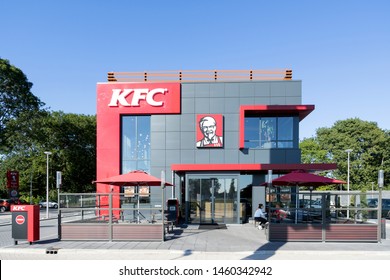 SPIJKENISSE, THE NETHERLANDS - JULY 2, 2019: KFC fast food restaurant. Kentucky Fried Chicken (KFC) is the world's second largest restaurant chain with almost 20,000 locations globally.