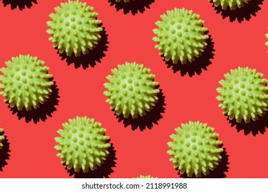 Spiky Yoga Ball On Red Background