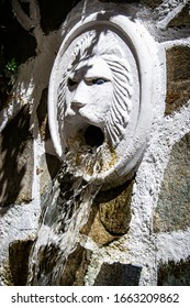 SPILI, CRETE ISLAND, GREECE – APRIL 28, 2017: Venetian Lion Head Fountain With Flowing Drinking Mountain Water.