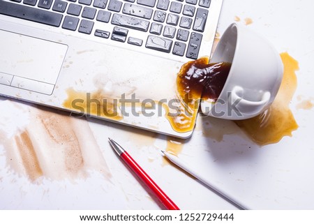 Spill coffee on a computer keyboard 商業照片 © 