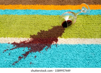 Spill Of Red Wine Over The Carpet