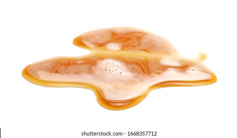 Spilled beer puddle with foam isolated on white background and texture, side view