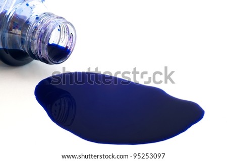 Spilled a bottle of blue ink on white background