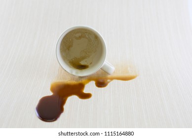 Spilled Coffee Cup Stain On Wooden Floor