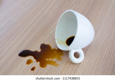 Spilled Coffee Cup Stain On Wooden Floor